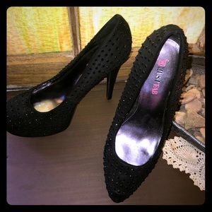 Black diamond studded pumps